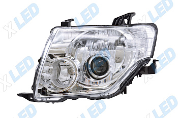 Фара Mitsubishi Pajero IV (2007-2010) линза ксенон, с электрокорректором (левая)