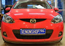 Установка би-ксеноновых линз Hella На mazda 2
